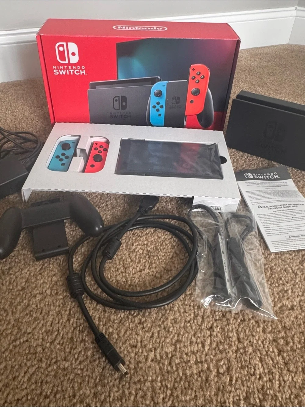 Nintendo Switch with Neon Blue Left and Neon Red Right Joy‑Con Pair